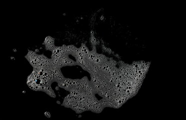 Soap foam, lather bubbles isolated on black background and texture with clipping path