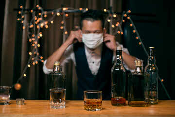 Barman pouring whiskey whiskey glass beautiful night
