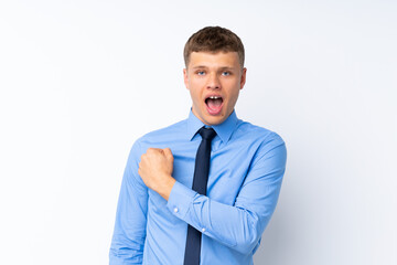 Young handsome businessman celebrating a victory