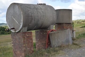 Rural water tank made by cement in the hills of Tuscany, central Italy