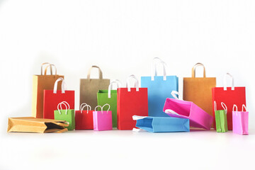 Colorful shopping bags on white background. Shopping service on online web and offers home...
