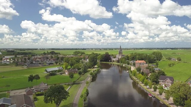 Nieuwekerk aan de Amstel, a place in Holland with a beautiful church at the river side