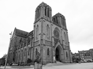 Saint-Germain Church. Beautiful neogothic style religious monument inspired by the famous Catholic Cathedral Notre-Dame-de-Paris. 
Shot in black and white. Flers, Normandy, France.