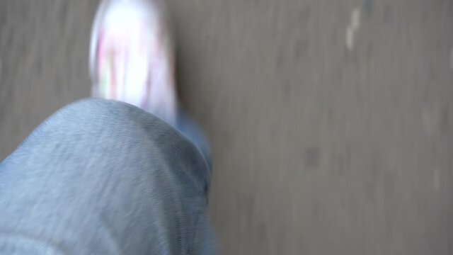 Man walking on the asphalt in the city 