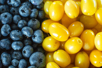 Mix of yellow and blue berries. Summer mick fruit. Berry layout