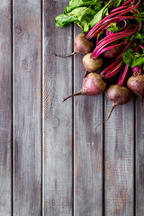 Beet harvest. Vegetables with green tops top-