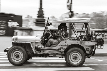 Paris, France: January 11, 2020: Typical army suv, off road wold war classic car Jeep Willys