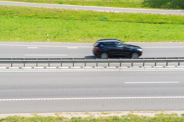 Cars driving at high speed along the highway