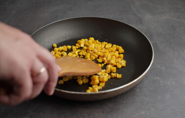 Diet. Organic Grilled Corn in a frying pan. Organic farm vegetables. Vegetarian