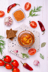 Canned cauliflower with vegetables in tomato sauce