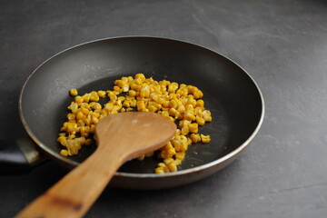 Diet. Organic Grilled Corn in a frying pan. Organic farm vegetables. Vegetarian