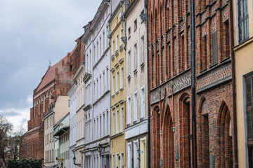 Fototapeta na wymiar Residential buildings in old part of Torun historic city in north central Poland
