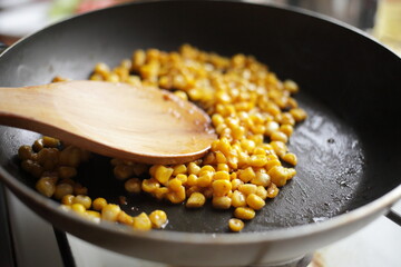 Diet. Organic Grilled Corn in a frying pan. Organic farm vegetables. Vegetarian