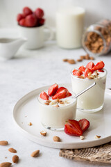 Natural strawberry yogurt with fresh berry and almond
