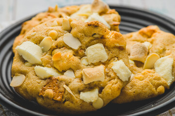 Freshly Baked Cookies- Smore White Chocolate Almonds on black plate (focused)