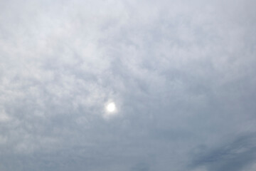 The rain has lifted and the sun is almost visible through the clouds in the sky