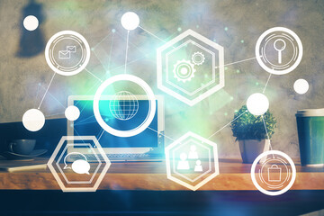 Computer on desktop with social network theme icon. Multi exposure. Concept of international connections.