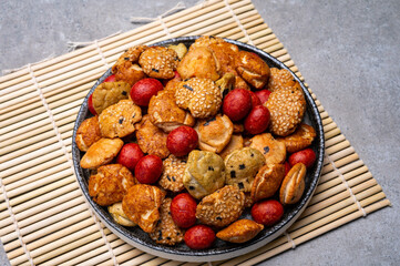 Tasty asian vegetarian appetizer, crunchy rice en peanuts snacks from Japan