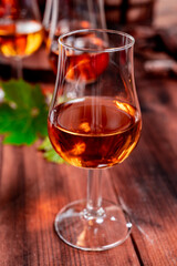 Tasting of aged french cognac brandy in old cellars of cognac-producing regions Champagne or Bois, France