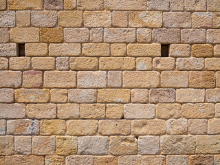 Real antique arab brickwall in sunny day background texture