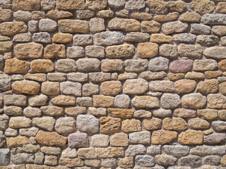 Real antique spanish rubble wall background texture