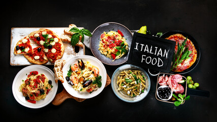 Italian food  on dark background