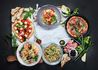 Italian food  on dark background