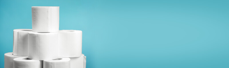A lot of Toilet paper closeup on blue background
