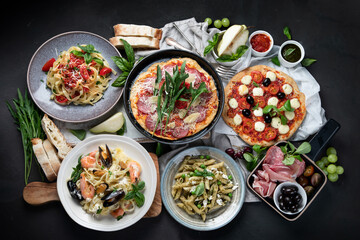 Italian food  on dark background