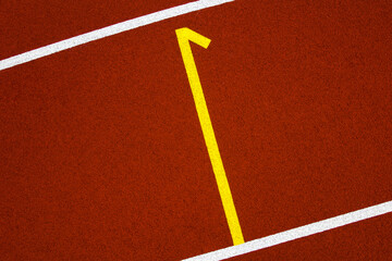 Red stadium running track closeup