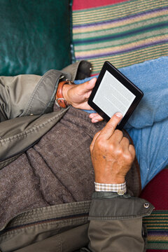 Senior man using an ebook reader