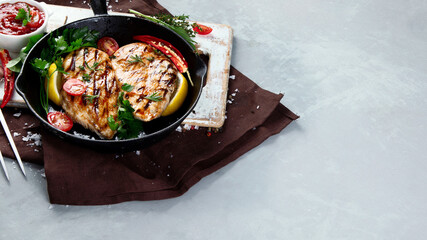 Grilled and raw chicken breast