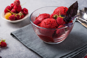 Organic raspberry Sorbet Ice Cream Balls in glass Ready to Eat. Organic Food.