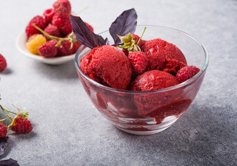 Organic raspberry Sorbet Ice Cream Balls in glass Ready to Eat. Organic Food.
