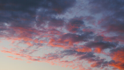 Evening sky at sunset. Beautiful natural background or desktop wallpaper. The rays of the setting...