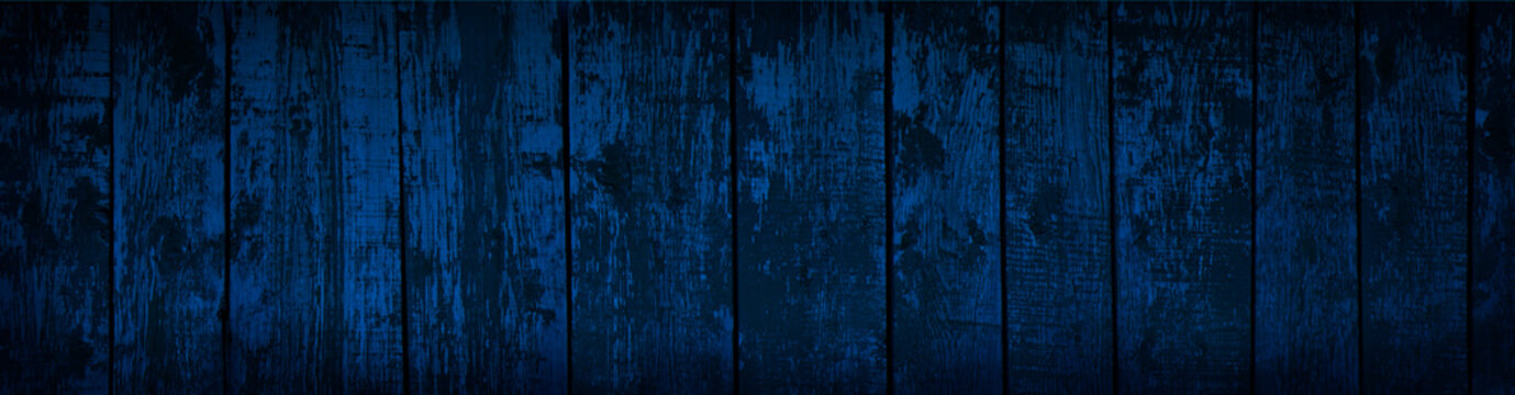 Blue wood texture. Dark blue wooden background. Grunge banner with toned texture of old painted shabby boards.