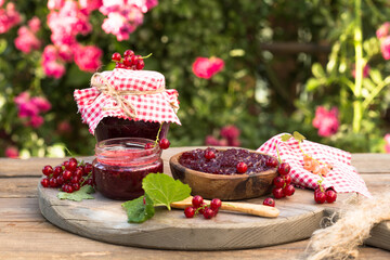 Homemade redcurrant jam. Fresh berries of currants. Concept cooking confiture