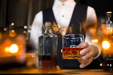 Bartender Serve Whiskey on wood bar