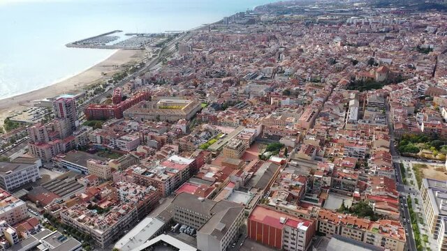 Aerial view of Mataro with buildings and coast line in the Spain. High quality 4k footage