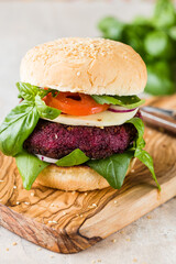 Veggie beet  burgers with vegetables and  greek sauce. Healthy food concept.