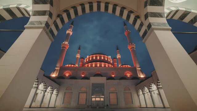 timelapse of mosque night to day 