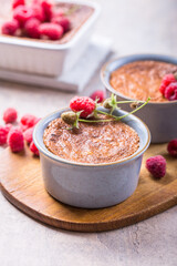 Rice pudding. French milk rice dessert with raspberries