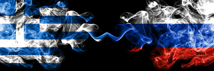 Fototapeta na wymiar Greece vs Russia, Russian smoky mystic flags placed side by side. Thick colored silky abstract smoke flags.