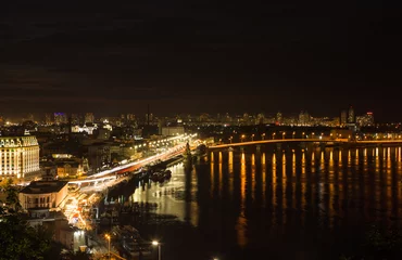 Foto op Plexiglas Beautiful View of the Dnieper river, Naberezhno-Kreschatitska street in Kiev, Ukraine. Night panorama of Kyiv © Maria