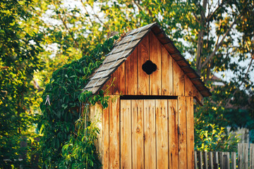 Wooden rural toilet in the bush, public toilet