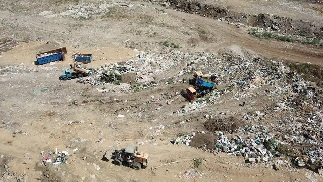 Garbage Truck In A Landfill. Huge City Dump, Top View.