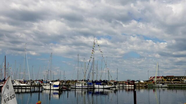 Cloud cover over a marina with yachts moored in southern Sweden