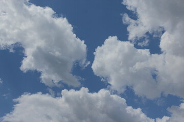white clouds in the blue sky