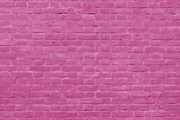 Pink brick wall. Loft interior design. Pink paint of the facade. Architectural background.