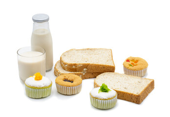 Milk , bread and small cake for snack time, isolated on white background.